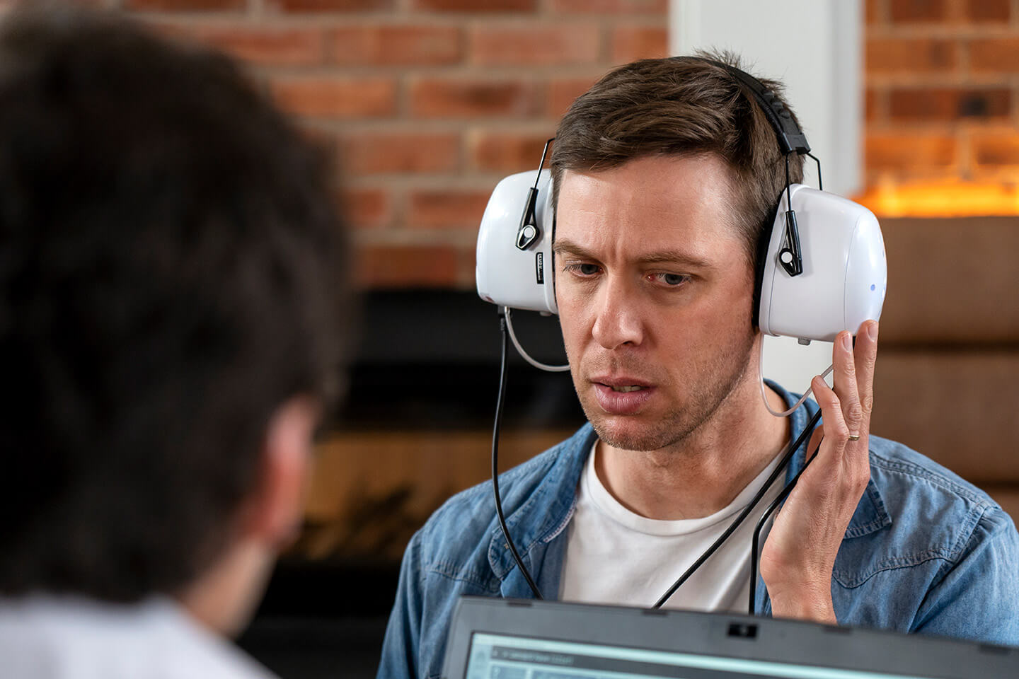 Mobile diagnostic hearing screening performed on-site for athletes